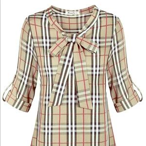 Classic & feminine this top is a must for fall